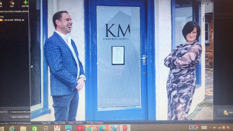 Chris and Jayne in front of their office