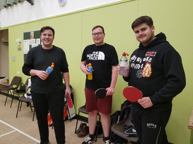 Brothers Drew and Callum Harbidge join Harry (R) for well-deserved rehydration