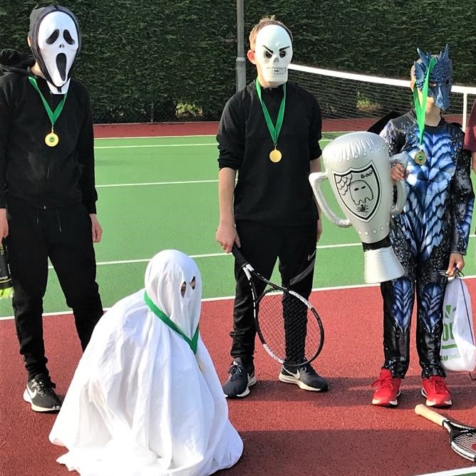 Children on a tennis court