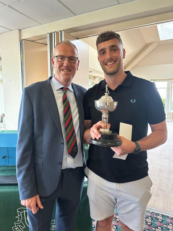 Callum Elliott receives the Vice Captain's Day trophy at Kibworth Golf Club